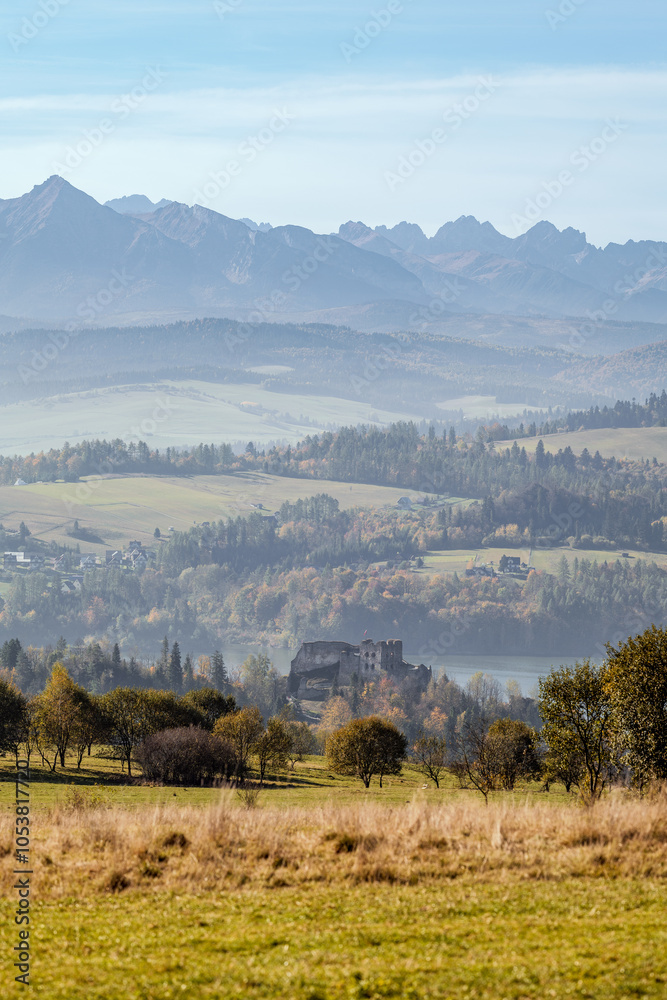 The castle in Czorsztyn against the background of the lake. Tatra Mountains in the background