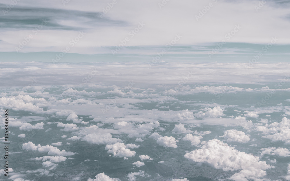 Fototapeta premium Flying in airplane view of blue sky and clouds Thailand.