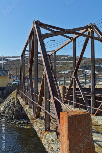 View of historical Strommen old bridge in clear summer weather, Båtsfjord. Norway. photo