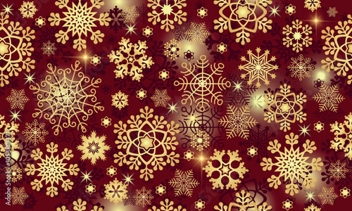 Vector seamless Christmas pattern with golden snowflakes and stars on a dark red background