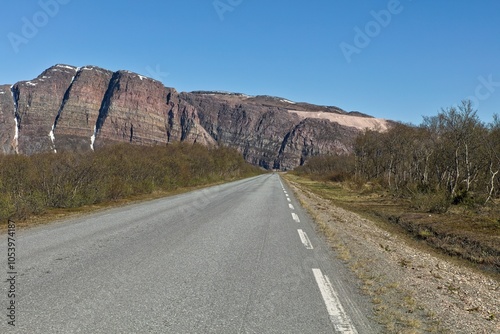 View of Austertanaveien road 890 in clear summer weather, Varanger Peninsula, Norway.