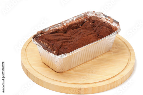 Belgian chocolate milk bun on a wooden plate with a white background. Soft bun filled with creamy Belgian chocolate and dusted with chocolate powder. Sweet, melt-in-mouth, best chilled.