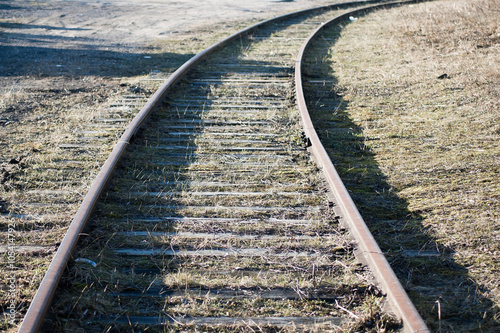 railway track on wooden sleepers close-up photo