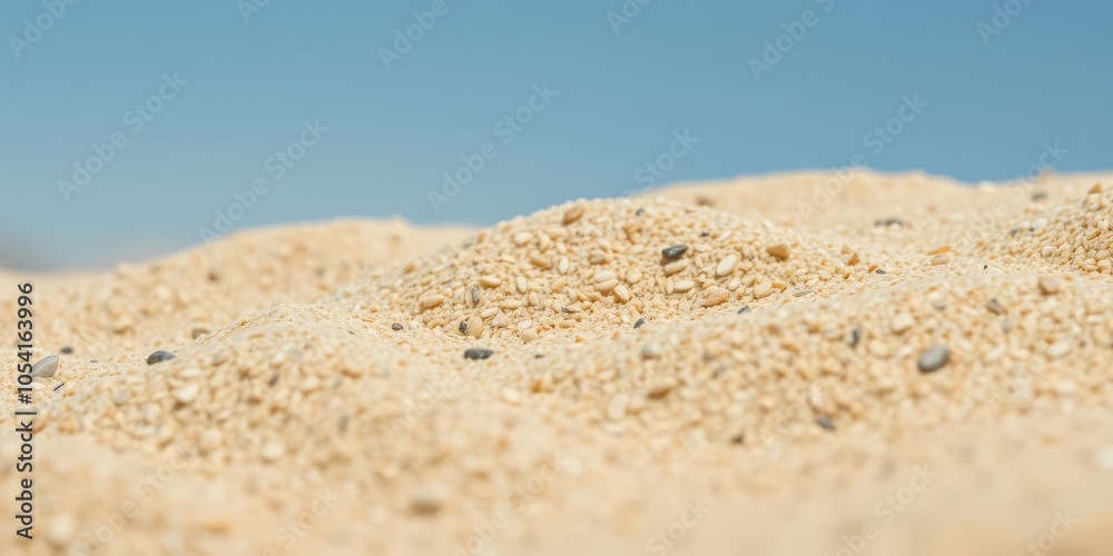 Fototapeta premium Rough and gritty beige sand texture background with tiny grains, background, pattern