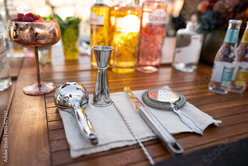 professional accessories on the table for making an alcoholic cocktail by a bartender photo