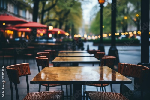 Charming street corner cafe with sidewalk tables and blurred cityscape silhouettes in background