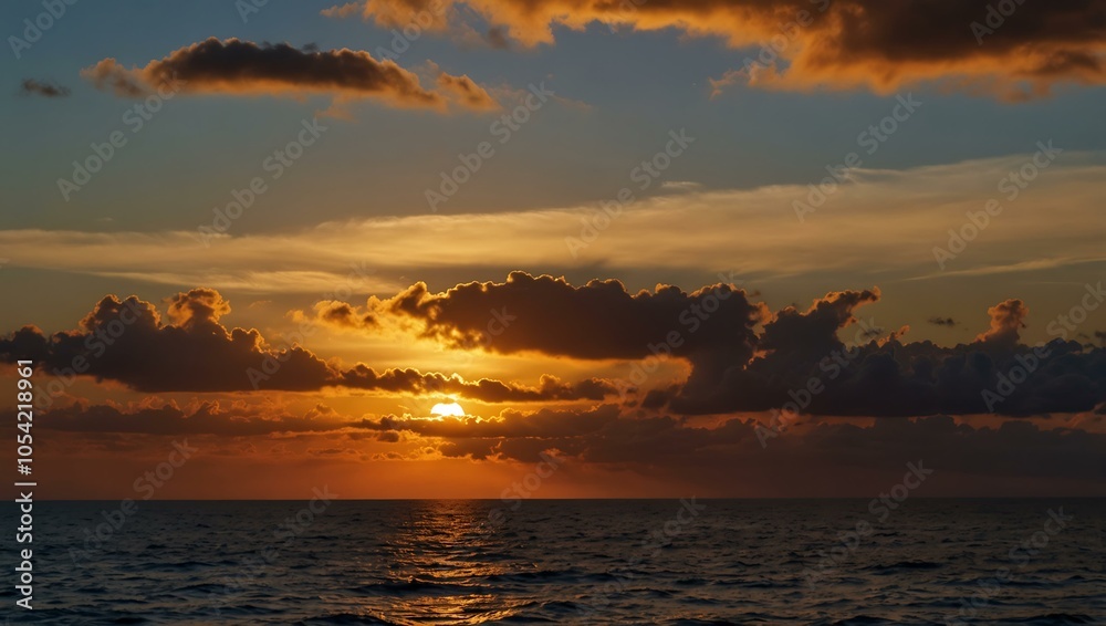 Sunset casting a warm glow over the ocean. Sunset casting a warm glow over the ocean.