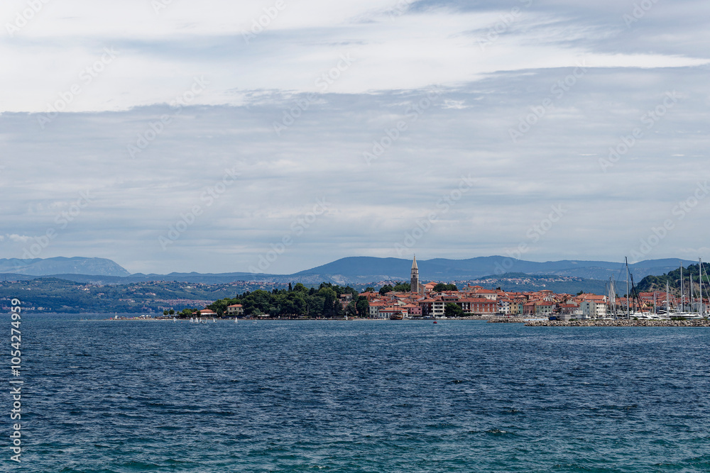 Fototapeta premium View on the Izola city from sea Adriatic coast.