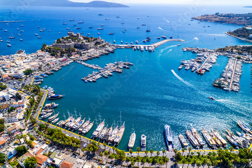 Fototapeta Naklejka Na Ścianę i Meble -  Bodrum District of Mugla, Turkey. Aerial view of Bodrum Castle (Castle of St. Peter). Panoramic view of Bodrum center, marina and castle. Drone shot.