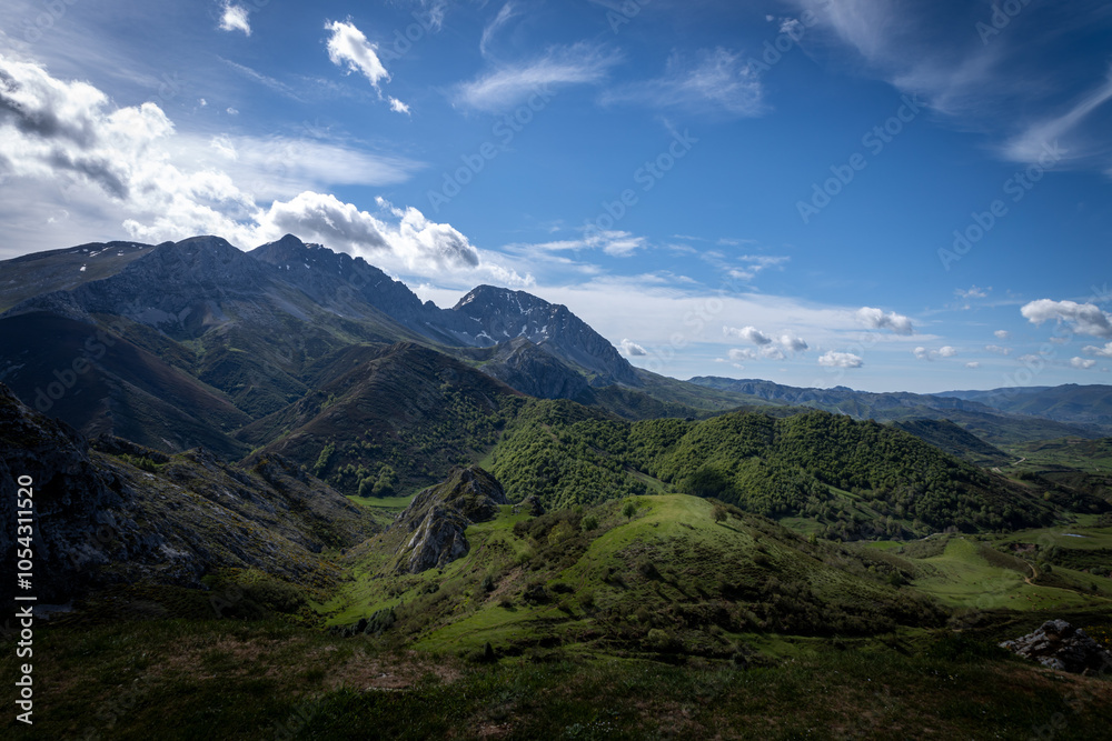 Fototapeta premium Asturian Mountains: Snowy Peaks and Verdant Forests