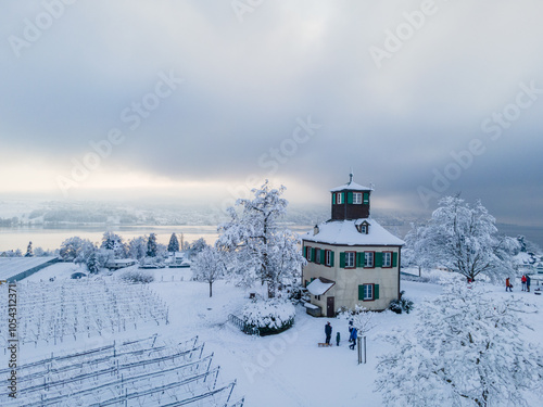 Hochwart auf der Insel Reichenau im Bodensee bei Winter im Schnee aus der Luft photo