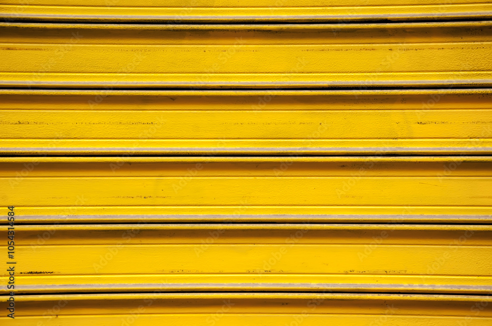 Fototapeta premium Entrance to the Storage. Yellow Metal Gate Background