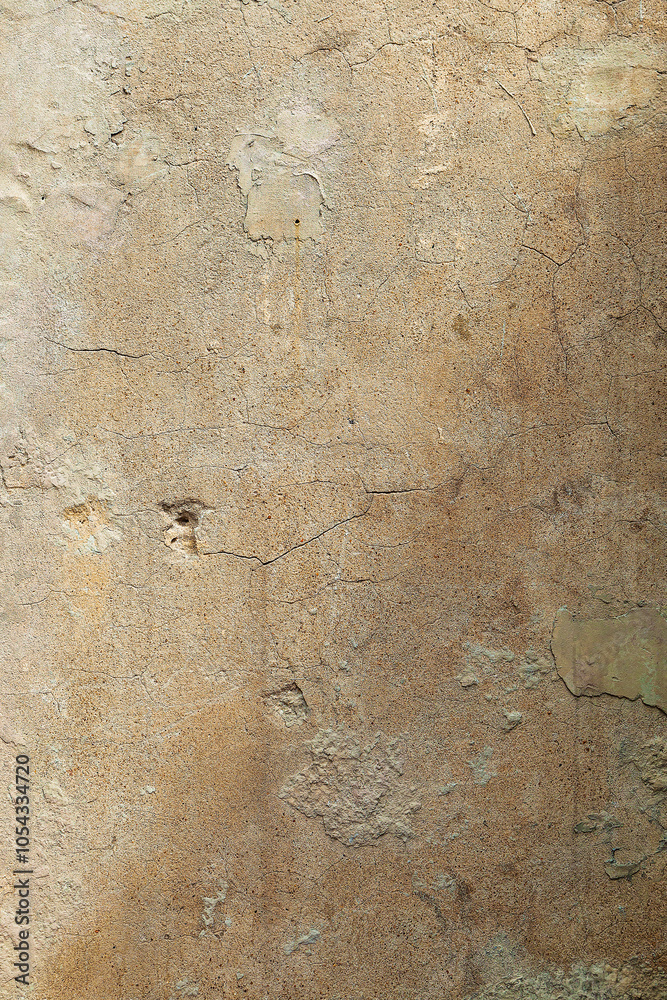 Background - beautiful old beige concrete wall partially illuminated by the sun Background - beautiful old beige concrete wall partially illuminated by the sun