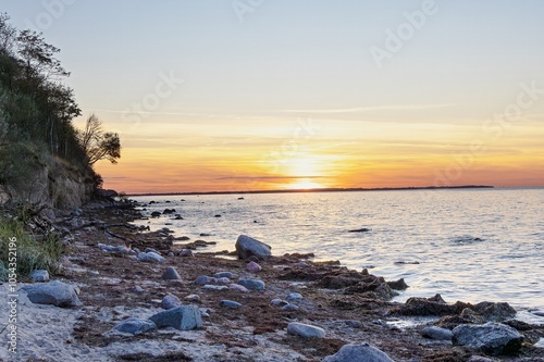 Obraz na płótnie Fantastic sunset on the cliffs of the Baltic Sea on the island of Poel w salonie