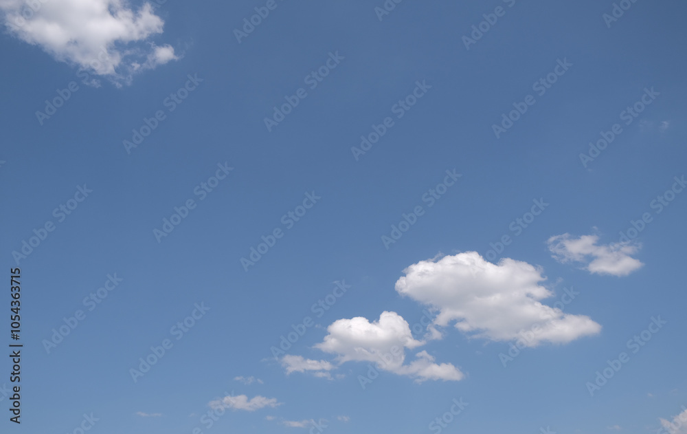 a soft blue sky with clouds