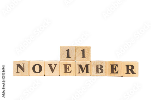 November 11, Wooden cube on isolated white background. World War I Ends, Angola independence, Washington State, National Metal Day, Poland Independence Day, Remembrance Day in Australia