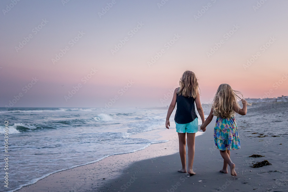 Fototapeta premium Walking on the beach