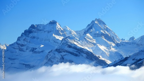 Snow-covered mountains, clear blue sky and crisp air