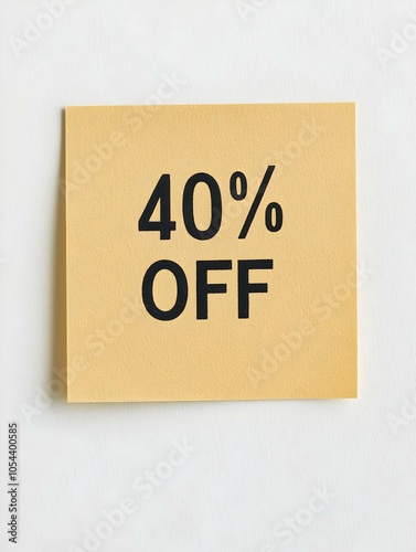 Black '40% OFF' Text on a Light Brown Square Paper Note. White Background 