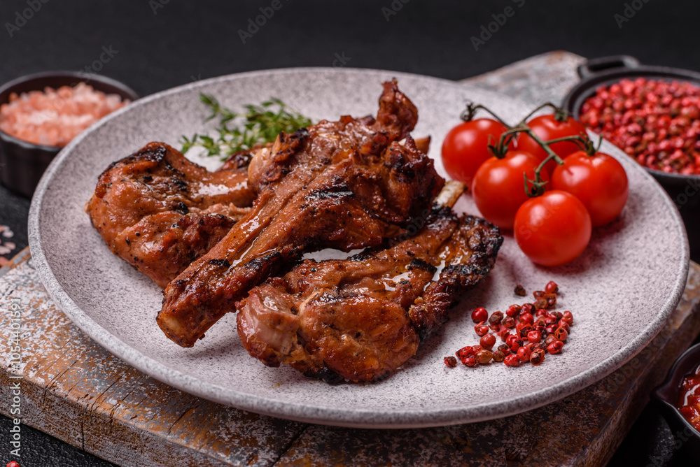 Ribs or rack of beef baked on the grill with salt, spices and herbs Ribs or rack of beef baked on the grill with salt, spices and herbs