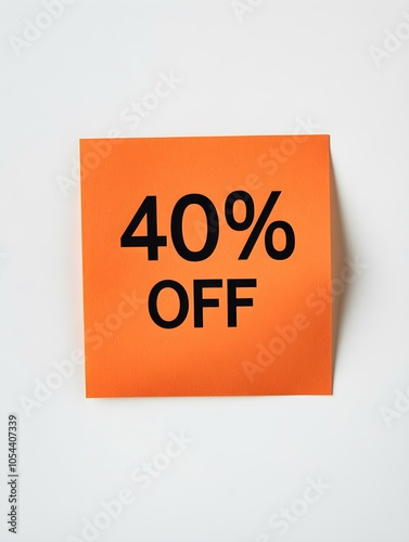 Black '40% OFF' Text on a Orange Square Paper Note. White Background 