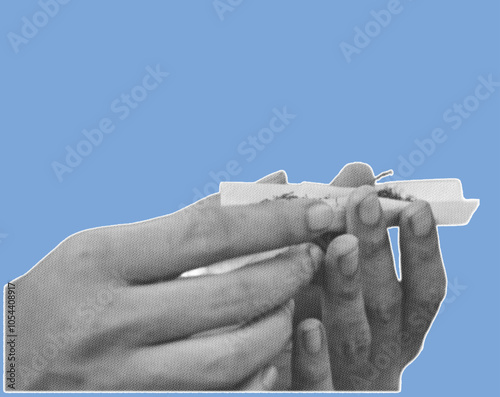 close up of hand rolled tobacco joint pixelate grayscale color halftone dotted texture style collage element isolated on blue background