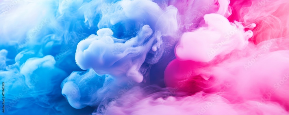 Colorful pink and blue smoke swirl in abstract background, creative concept Colorful pink and blue smoke swirl in abstract background, creative concept