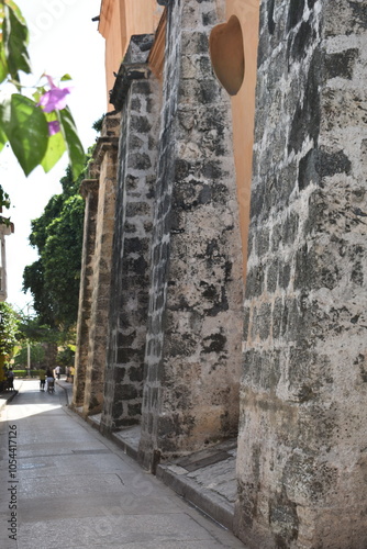 Flying buttress, buttress, arc-boutant, arch buttress, on side of 17th century building in the historic district of the old Spanish fort city of Cartagena, Colombia photo