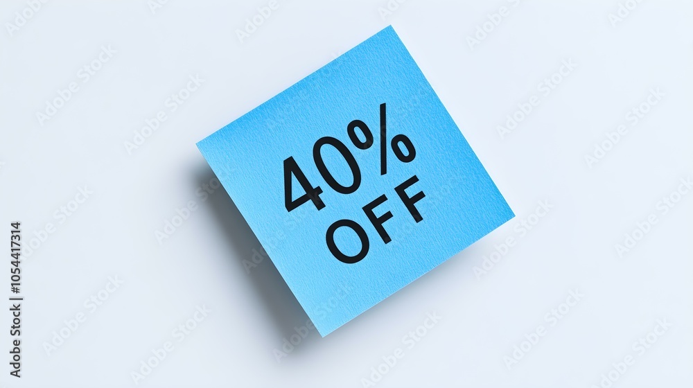 Black '40% OFF' Text on a Blue Square Paper Note. White Background with Copy Space Black '40% OFF' Text on a Blue Square Paper Note. White Background with Copy Space