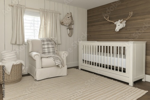 Rustic neutral toned nursery with a crib and cozy rocking chair decorated with a deer head offering a calm natural ambiance for a soothing baby environment