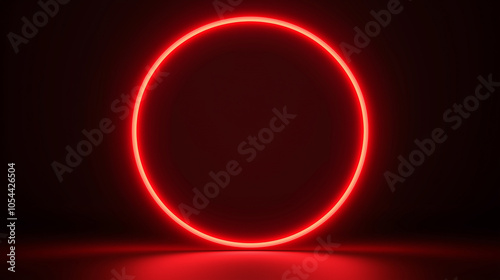 Glowing red neon circle on black background representing futuristic design, modern technology, illumination, minimalistic style, energy, vibrant red light, nightlife concept, and visual effects.