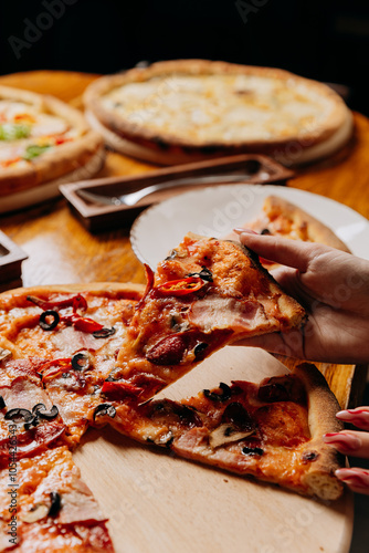 Sharing delicious pepperoni pizza slice with friends, gatherings and casual dining moments