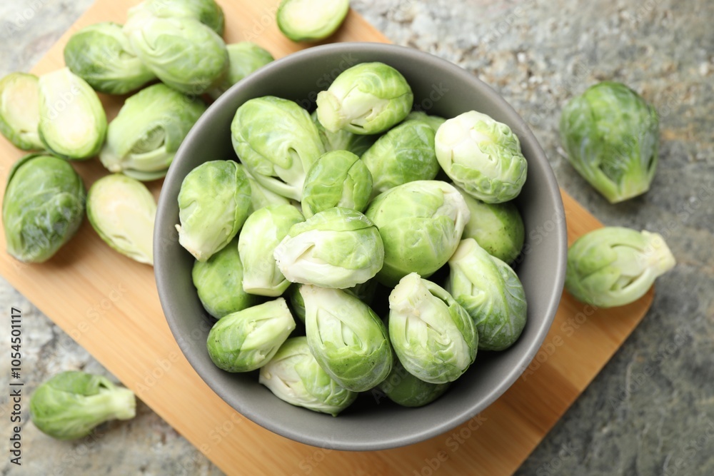 Fresh green Brussels sprouts on grey textured table, flat lay Fresh green Brussels sprouts on grey textured table, flat lay