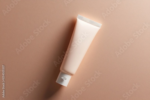 Adapalene medical cream tube shown on a neutral background. photo