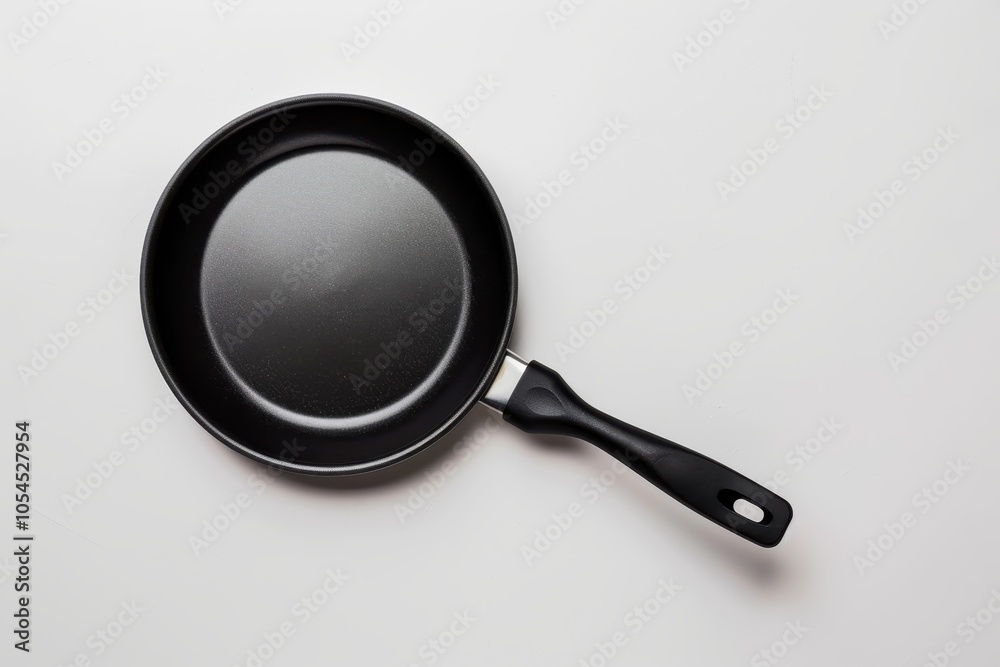 Black skillet against white backdrop Black skillet against white backdrop