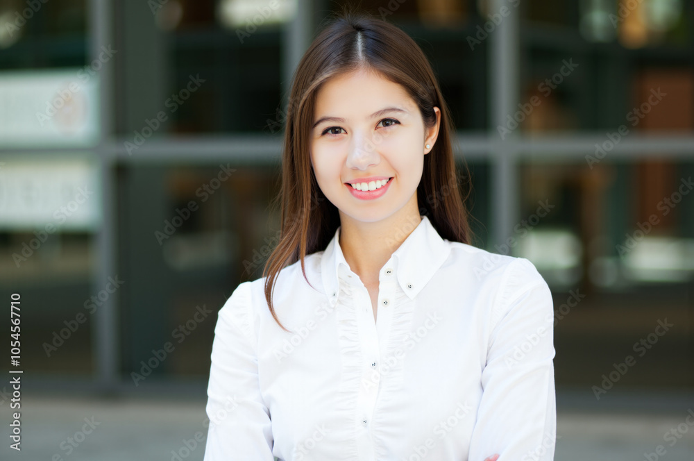 Young asian businesswoman smiling outdoors Young asian businesswoman smiling outdoors