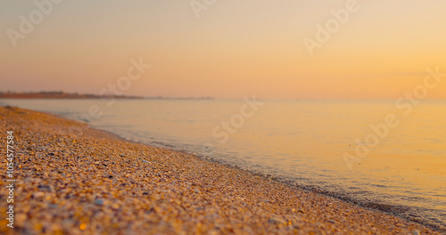 Beautiful landscape with bright golden waves at sunset. Beautiful landscape, travel destinations, enjoying holiday, Sea, vacantion seaside. photo