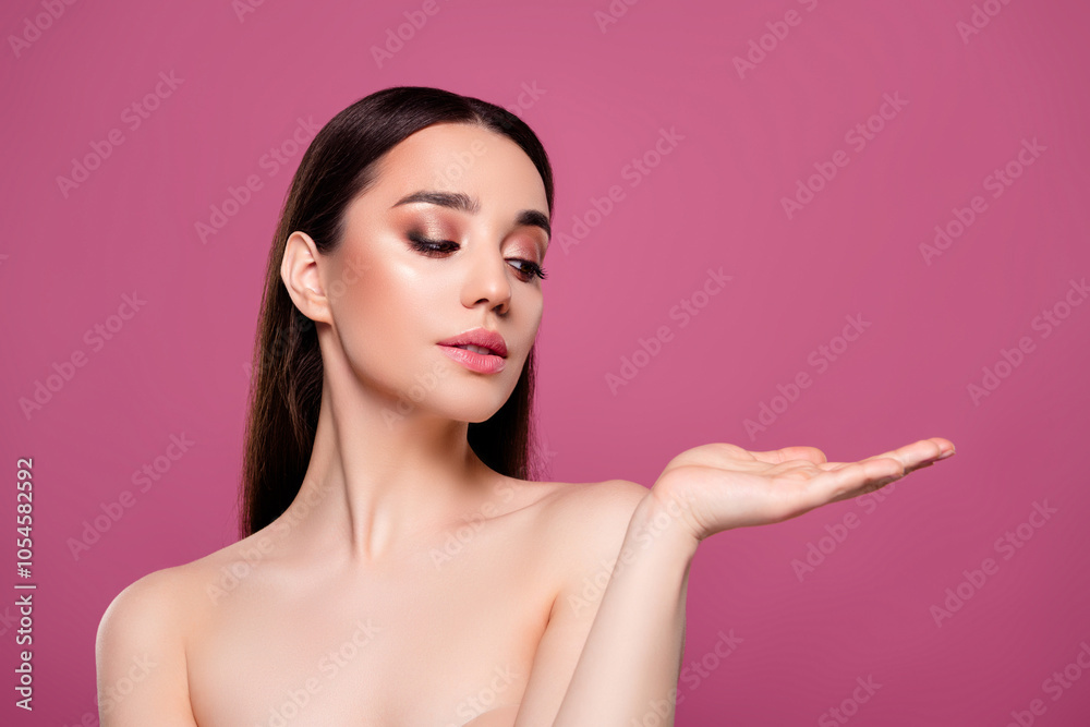 Photo of attractive girl hold hand look demonstrate empty space for adverts on pink background Photo of attractive girl hold hand look demonstrate empty space for adverts on pink background