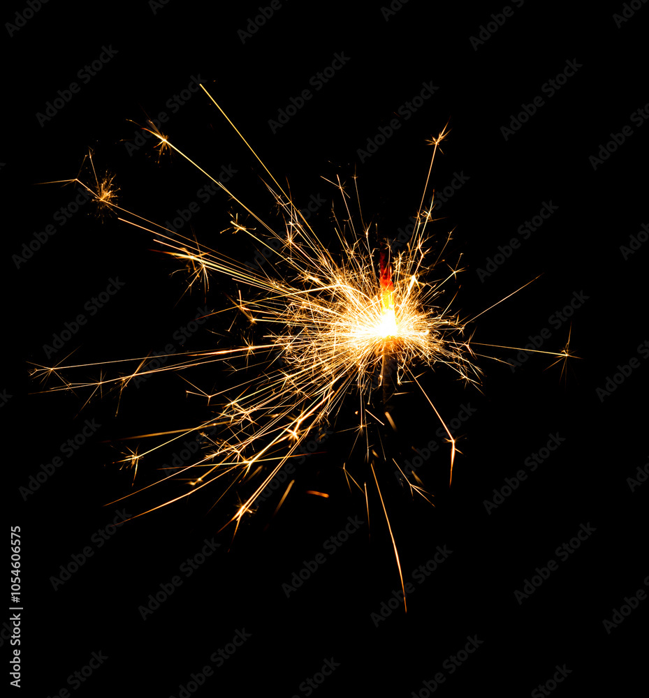 Christmas sparkler burning isolated on black background... Christmas sparkler burning isolated on black background...