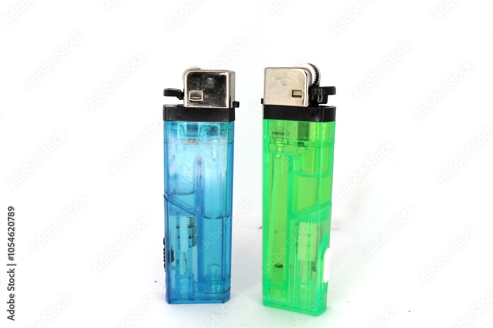 Two transparent lighters are placed side by side on a white background. Two transparent lighters are placed side by side on a white background.