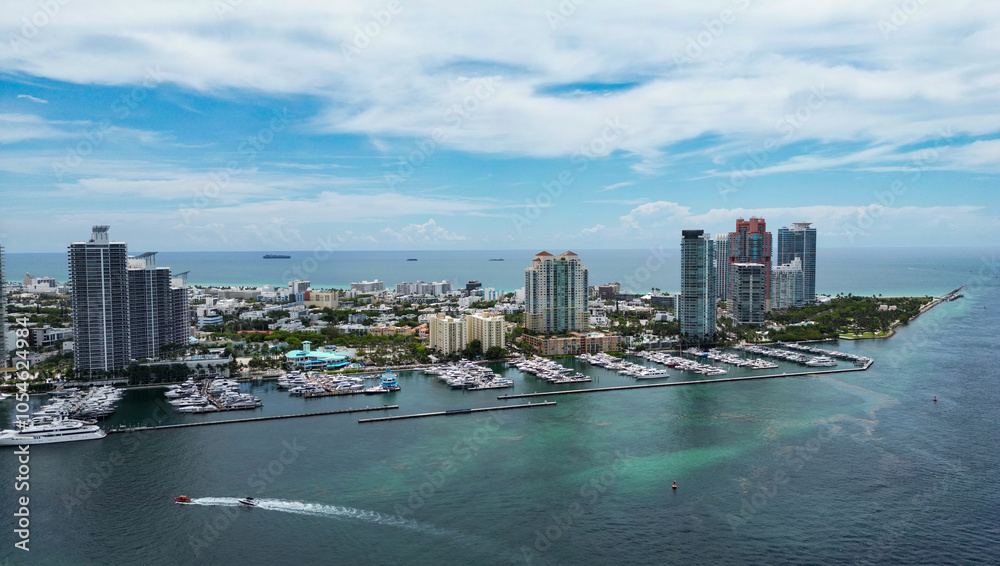 Obraz premium Aerial view of Miami Beach, Florida, United States. Drone shot of Miami on sunny day. Miami Beach, wonderful aerial view of buildings. Panorama view of Miami Beach, South Beach, USA.