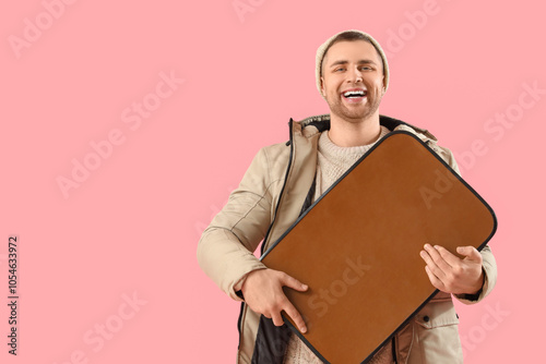 Male tourist in warm clothe...