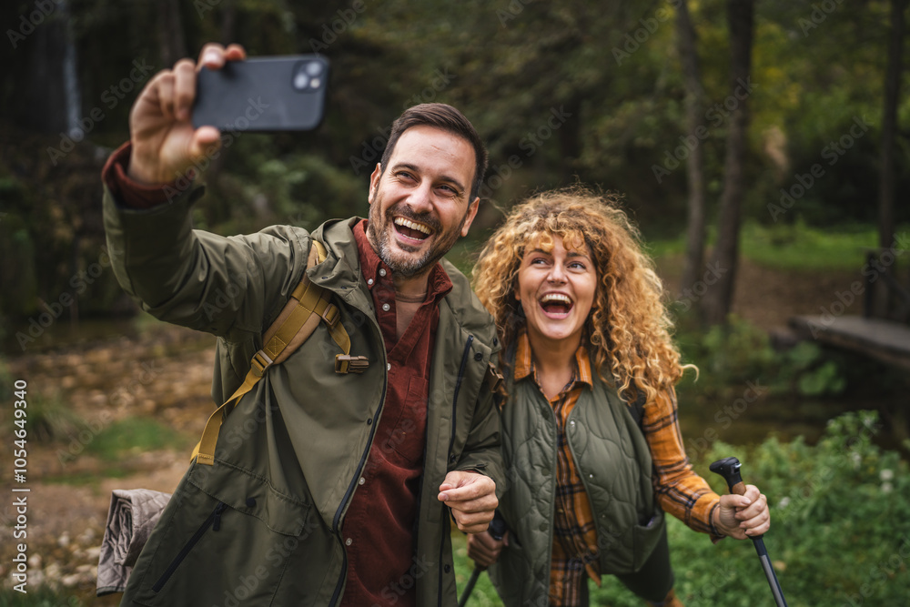 husband and wife hiker take a self portrait or video call on hiking husband and wife hiker take a self portrait or video call on hiking