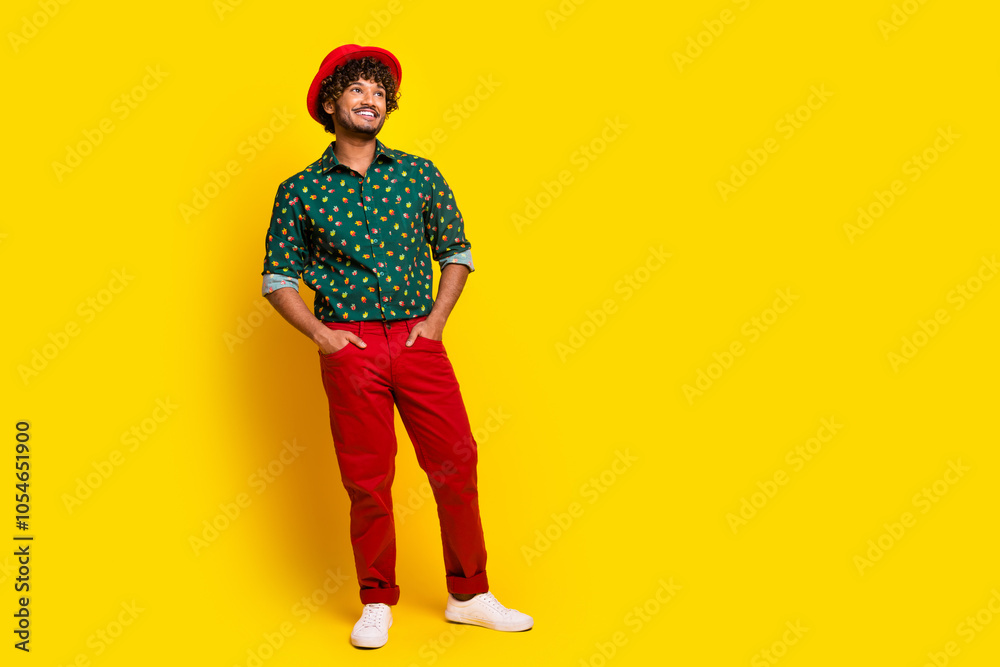 Full body portrait of nice elegant young man look empty space wear shirt isolated on yellow color background Full body portrait of nice elegant young man look empty space wear shirt isolated on yellow color background