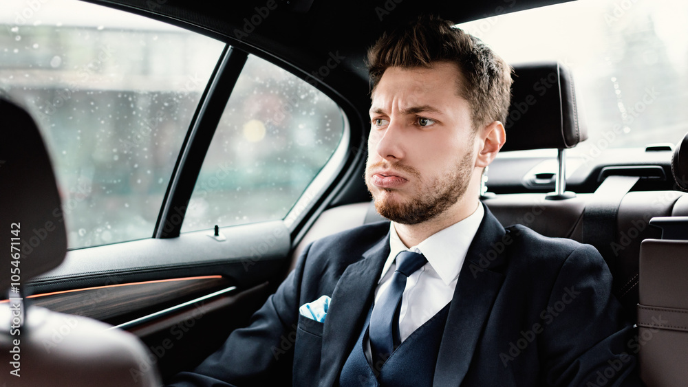 Got Stuck In A Traffic Jam. Annoyed worker sitting in the backseat of luxury car, being late Got Stuck In A Traffic Jam. Annoyed worker sitting in the backseat of luxury car, being late