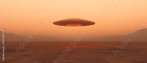 A sleek, futuristic UFO hovering in the sky during a captivating sunset, with soft orange hues and a serene landscape below. photo