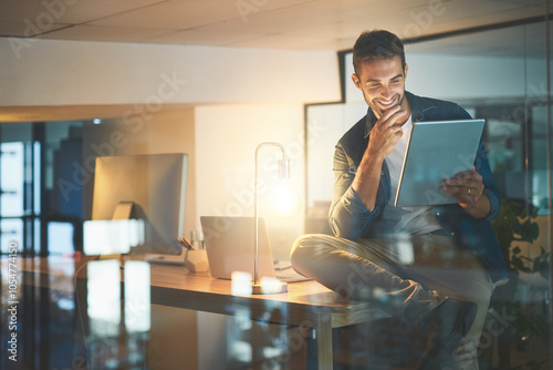 Business, office and happy man on tablet at night for research project, online website and internet. Professional, startup and worker on digital tech working late for planning, networking and email