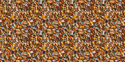 Seamless Pattern Texture Background: A close-up, top-down view of colorful decorative gravel, filling the entire frame