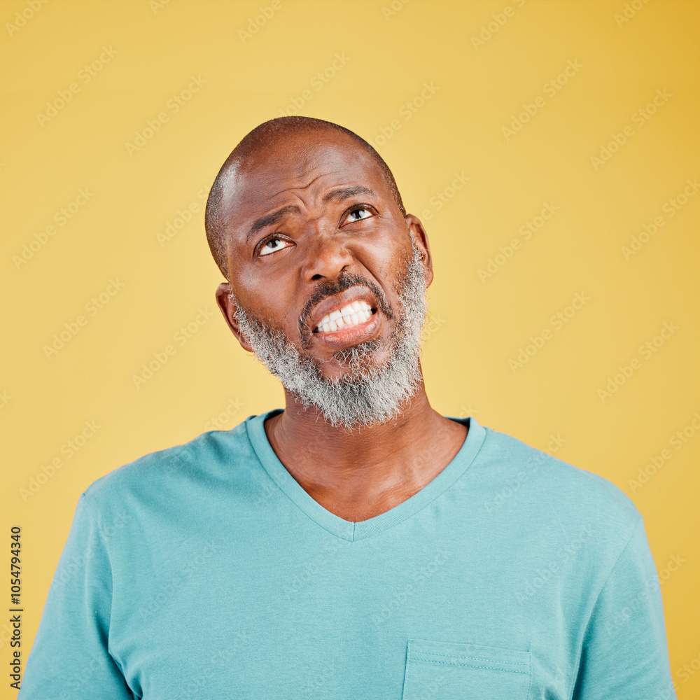 Obraz premium Thinking, frustrated and mature black man in studio with memory, problem solving or decision. Remember, doubt and confused person with brainstorming, ideas and planning choice on yellow background