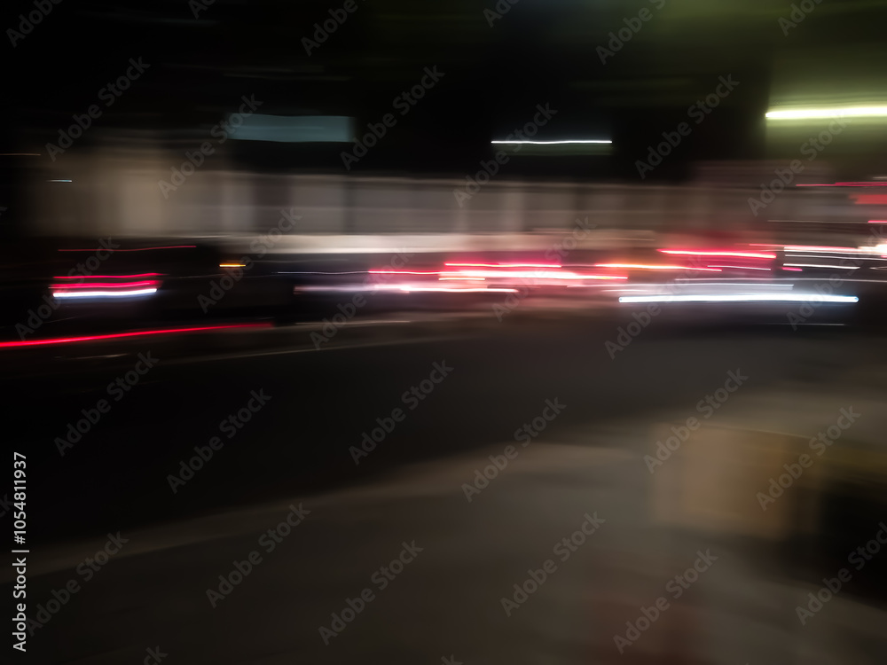 Fototapeta premium Abstract light art background with dynamic movement is the result of light painting photography capturing speed and energy with elegant lines of light.